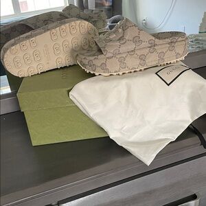 Gucci Beige Patterned Slip-Ons